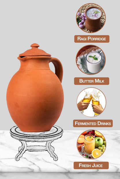Clay water Jug placed on a stand, suitable for storing fresh juice, mineral water, or wine in an eco-friendly way.
