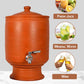 Clay water Pot placed on a stand, suitable for storing fresh juice, mineral water, or wine in an eco-friendly way.
