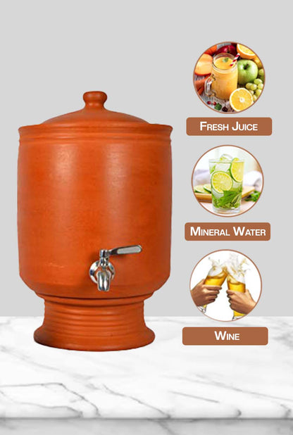 Clay water Pot placed on a stand, suitable for storing fresh juice, mineral water, or wine in an eco-friendly way.
