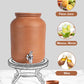 Clay water Pot placed on a stand, suitable for storing fresh juice, mineral water, or wine in an eco-friendly way.
