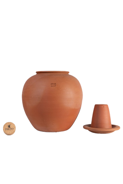 Clay water Pot with lid & Glass in matka style, handcrafted by Village Decor on white background.
