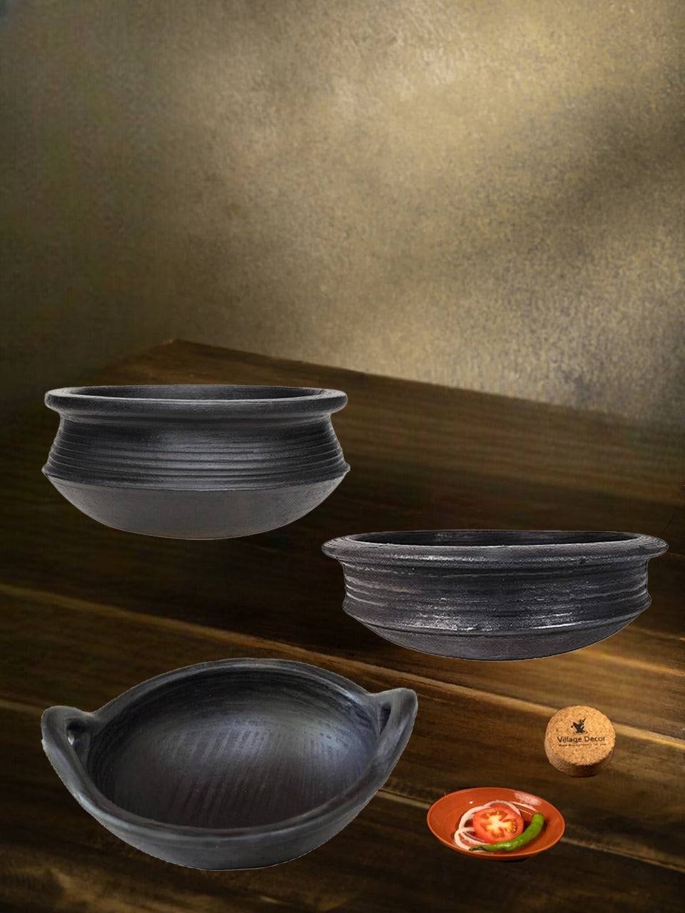 Black clay cookware combo featuring traditional handmade sets on a rustic wooden setup, perfect for authentic cooking and earthy kitchen vibes.