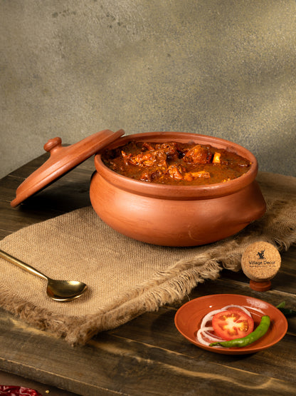 Earthen clay cooking pot ideal for preparing a variety of traditional dishes like Sambar, Kootu, Kuruma, Gravy, Dry Curry, and Biryani.