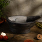 Traditional Handmade Kharal placed on table surrounded by fresh ingredients.