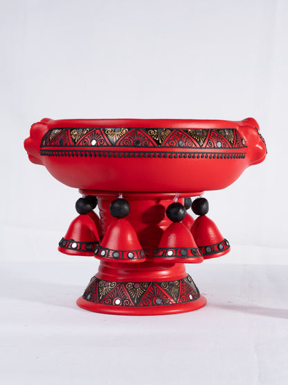 Top view of a colorful handpainted terracotta  urli with floral art, placed on a white background, ideal for festive decor or pooja setups.
