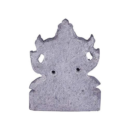Back view of handcrafted black stone Ganesha idol showing natural stone texture and detailed carving finish.

