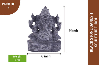 Black stone Ganesha idol with 9 inch height and 6 inch width, handcrafted sculpture for pooja and home decor use.

