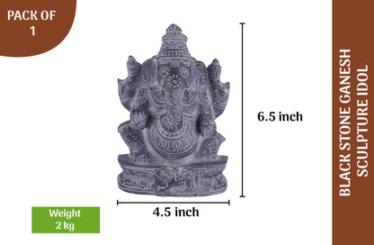 Black stone Ganesha idol with 6 inch height and 4 inch width, handcrafted sculpture for pooja and home decor use.
