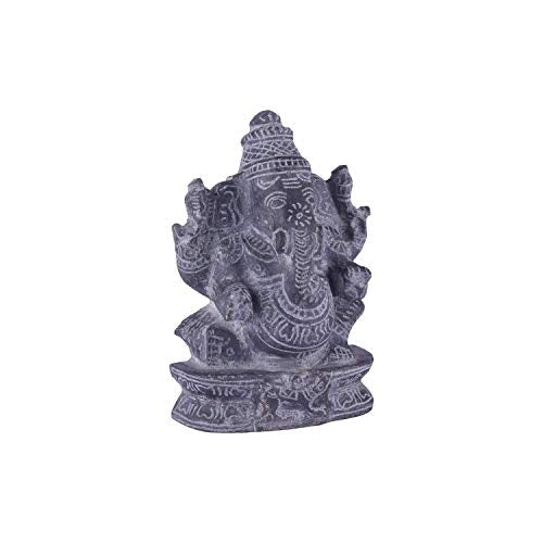 Side angle view of black stone Ganesha idol showing detailed carvings, handcrafted sculpture for pooja and decor.
